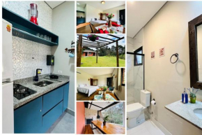 Casa com 2 Lofts Perto do Centro Turístico Capivari, Belíssimo Jardim com Vista, WI-FI, ideal para casais ou famílias